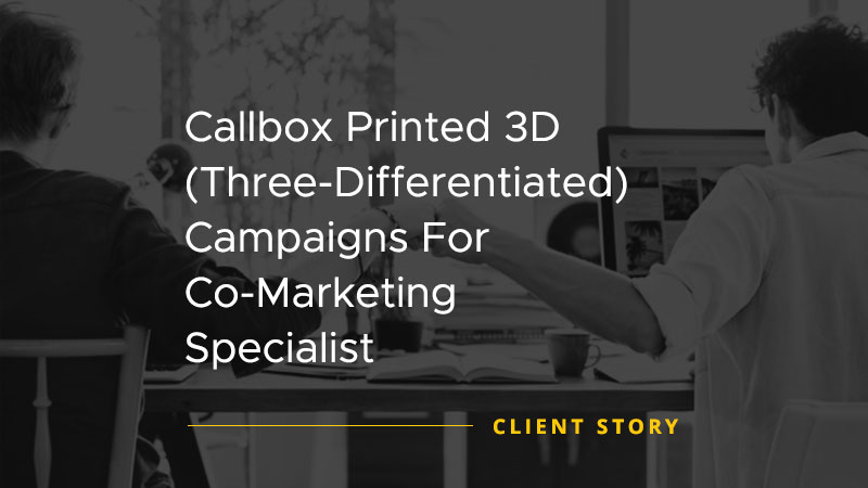 A black and white image of two colleagues fist bumping each other